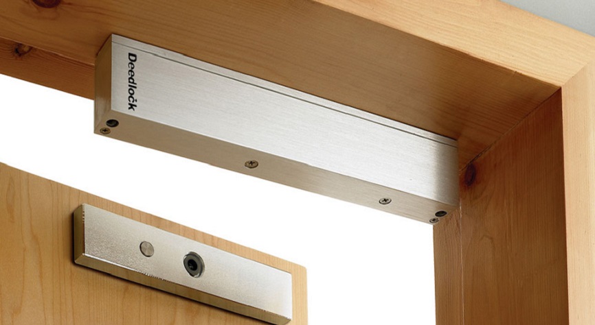 ACCESS CONTROL 1 Magnetic door lock system to help protect your business. Lignum Tech